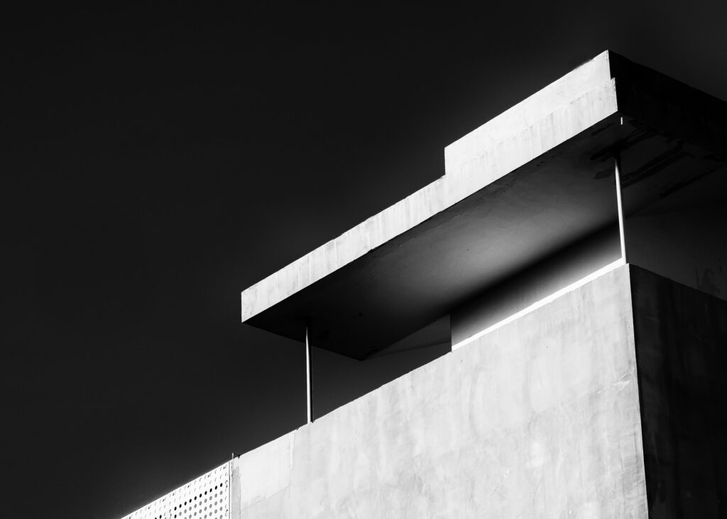 Abstract architecture design. Black and white futuristic exterior background. Black sky copy-space